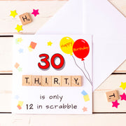 30 is only 12 in Scrabble. 30th Birthday Card. Illustrated with party balloons and confetti and hand finished with wooden scrabble tiles. Shown with white envelope - fizzi~jayne