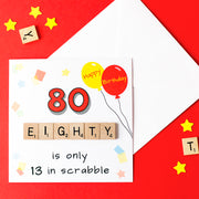 80th birthday card. 80 is only 13 in scrabble. Illustrated with birthday balloons and conferri hand finished with wooden scrabble tiles. by fizzi~jayne