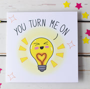 You Turn me on Kawaii cute lightbulb character on a greeting card