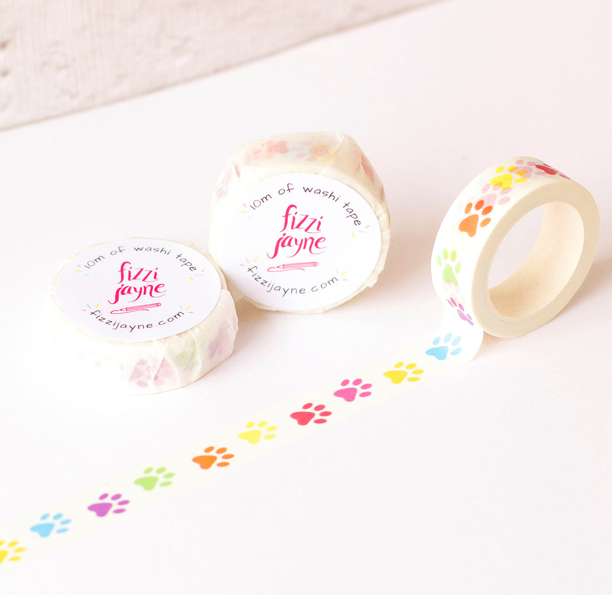 Environmentally packaging for the Rainbow paw print washi tape by fizzi jayne