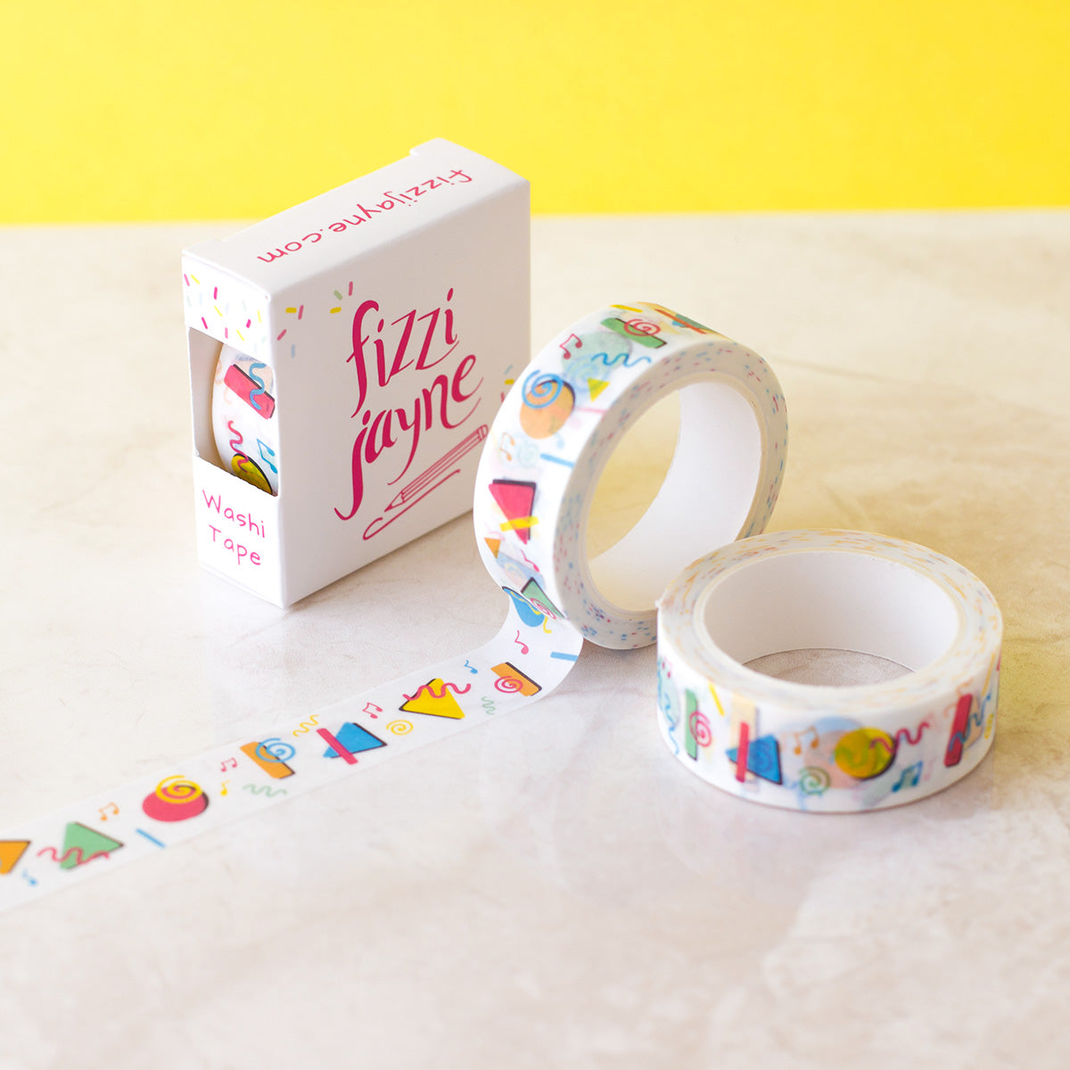 Colourful Washi Tape packaged in a box. Design is 90s inspired, Memphis style with musical notes