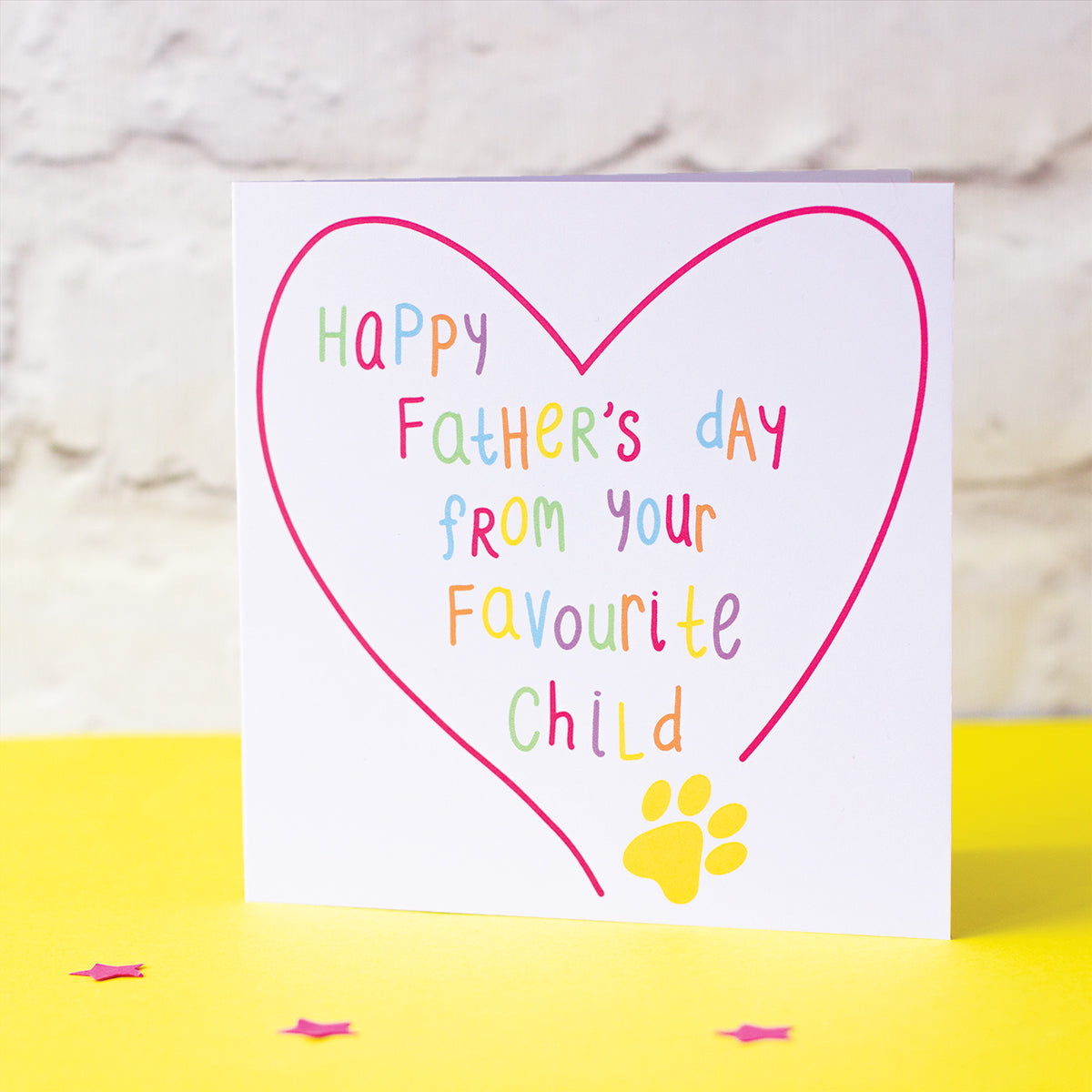 Happy Father's Day from Your Favourite Child with a paw print and a heart drawn around. text is in various colours and illustrated to look like the writing is by the dog or cat so it's fun and colourful.
