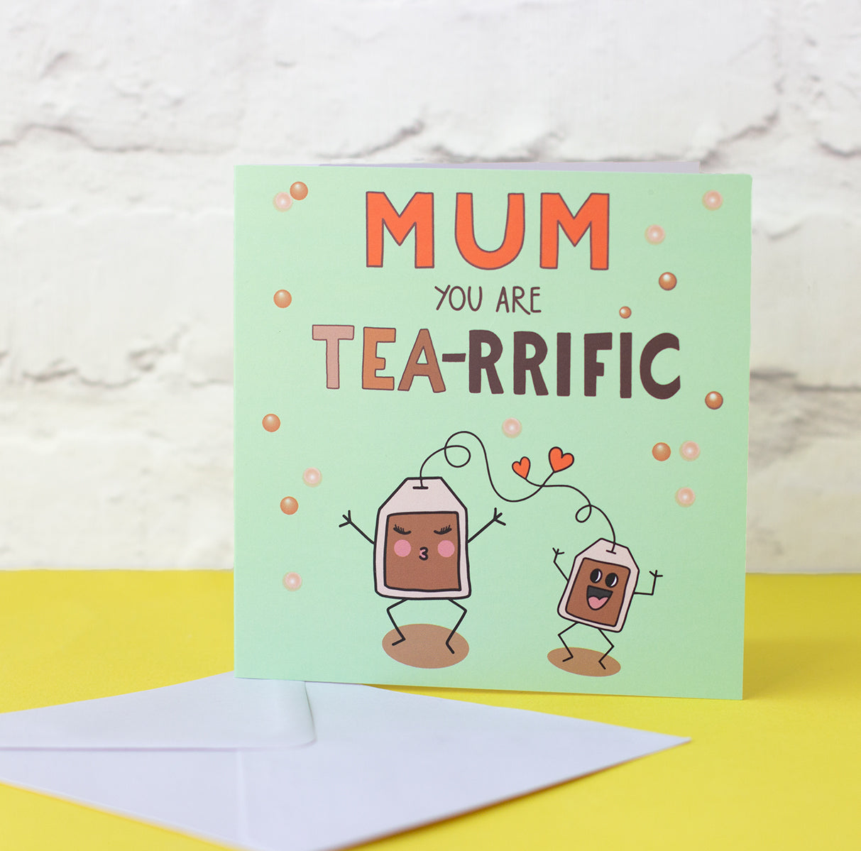Illustrated Mother's Day/Birthday card for a tea drinking Mum. Dancing tea bags with hearts. Greeting card and envelope