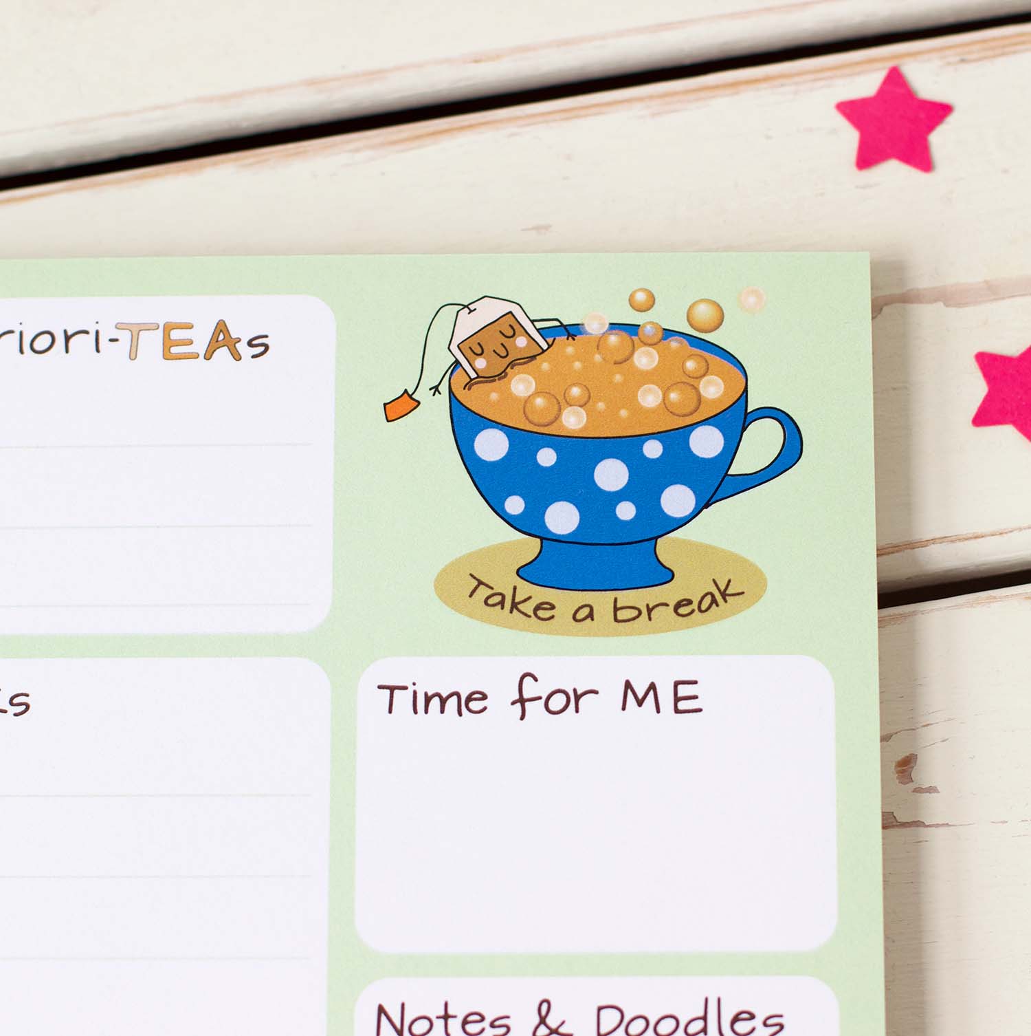 right top corner has an illustration of a happy teabag in a jacuzzi of tea with the words Take a Break and underneath a section for Time For Me where you can write your self care priority for the day