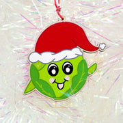 Kawaii style sprout with a cheeky smile wearing a Santa Hat printed on  to wood as a Christmas Ornament decorations